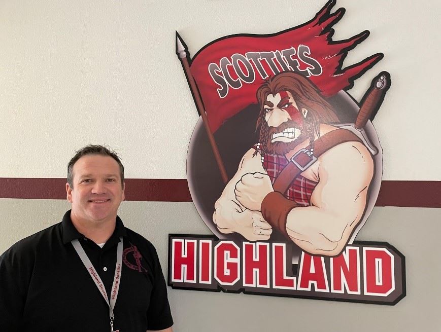  HJH Principal Don Strother stands next to HJH Scottie Mascot picture